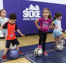 children playing soccer at Weber gymnasium